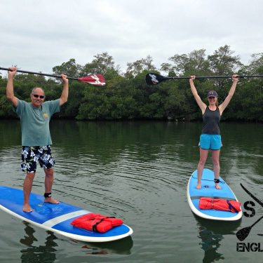 Paddle board lessons include time on land and in the water practicing your skills