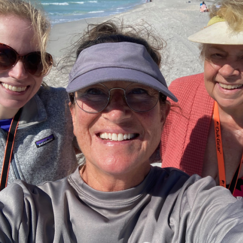 people on the beach at Don Pedro Island